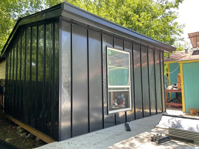 Black standing seam metal wall panels for Metal Roof Installation in Laguna Beach